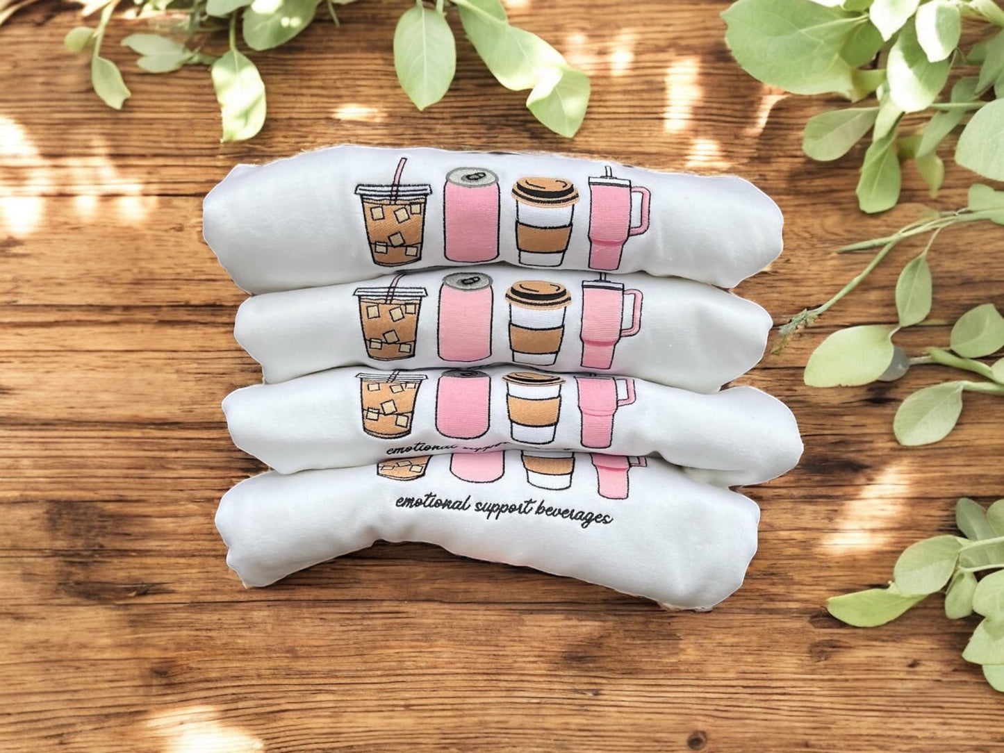 Stack of Emotional Support Beverages crewnecks