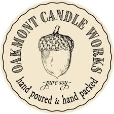 Oakmont Candle Works logo with an acorn design on a white background
